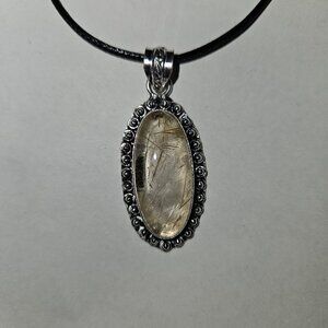 Golden rutile in quartz gemstone pendant, silver plate, artisan made, new
